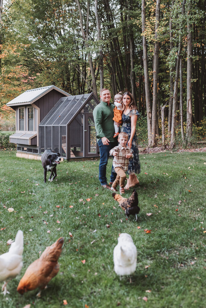 unconventional family photo with chickens and family dog