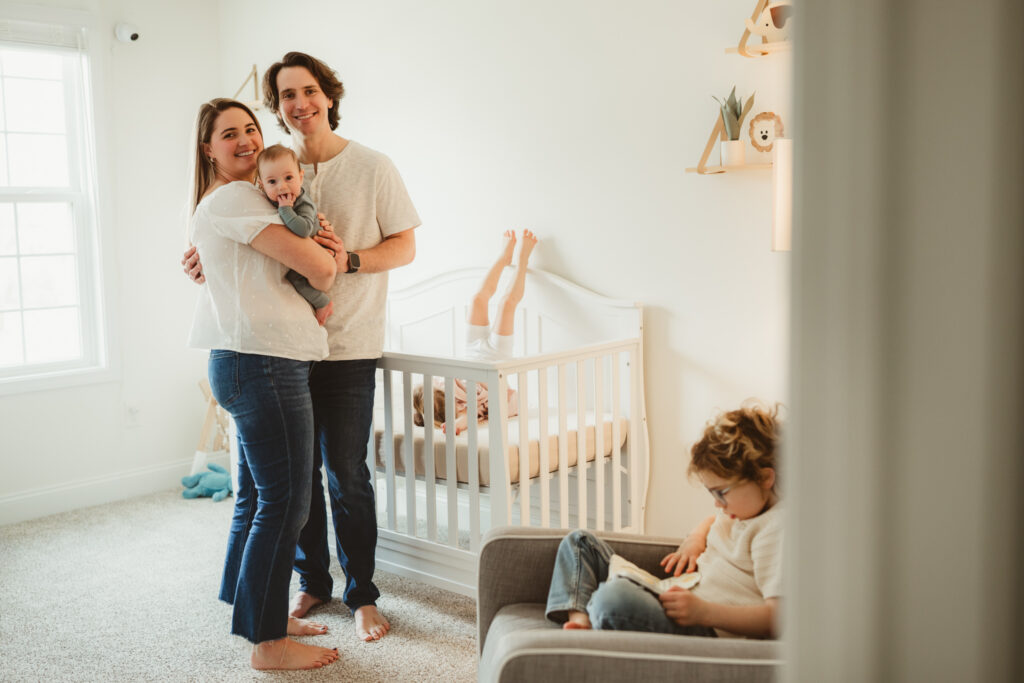 unconventional family portrait in the nursery