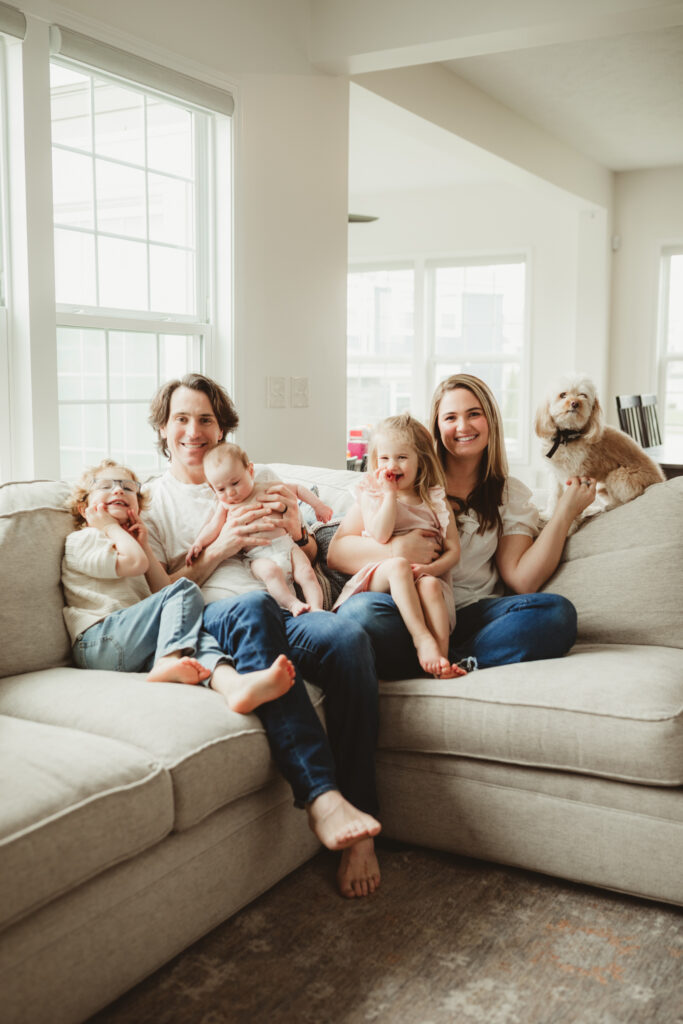 everyone looks and smiles at the camera